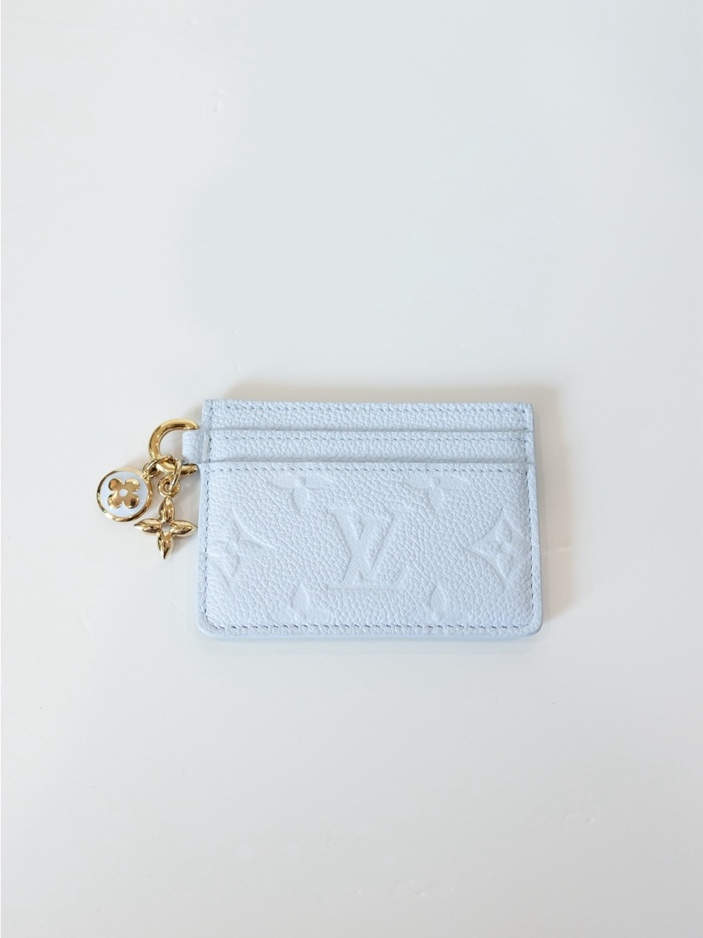 Louis Vuitton Pale Blue Embossed Monogram Card Holder with Gold Charm
